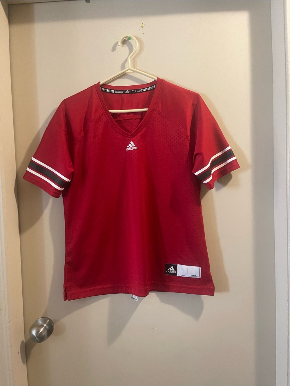 adidas women’s Red Short Sleeve V-Neck Jersey with Contrast Sleeve Stripes